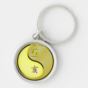 Tweelingen & metalen zwijn sleutelhanger