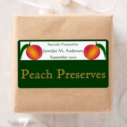 Tweelingperziken ingelijst in groen zelfgemaakt et etiket (Insitu)