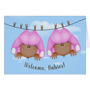 Twin Baby Girls On Clothesline