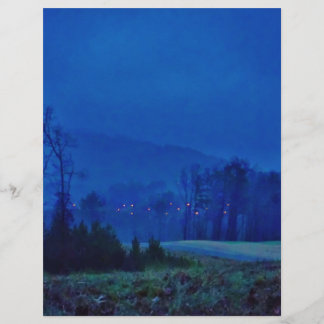 Twinkellichten in een blauw gebergte