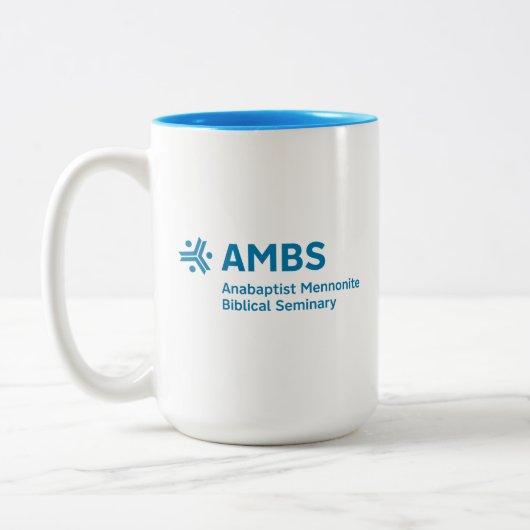 Two-tone mug with AMBS logo (Gauche)