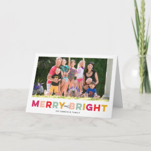 Type coloré Joyeux et carte de vacances pliée bril