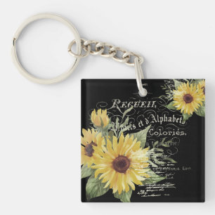  typografie en zonnebloemen op zwart sleutelhanger