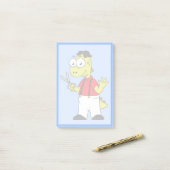 Tyrannosaurus rex kapper met schaar. post-it® notes (Op bureau)