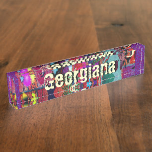 U-pluim kleuren/graffiti-kunst op brick-muur naambordje