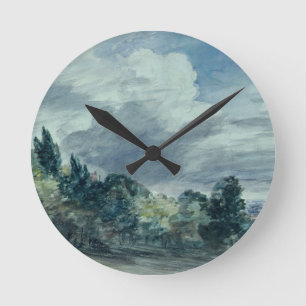 Uitzicht over een breed landschap, met bomen in de ronde klok
