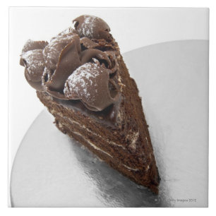Uitzicht van chocoladetaart met verhoogde druk tegeltje