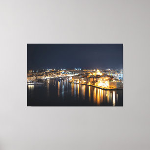 Uitzicht van drie steden op Malta 's nachts Canvas Afdruk