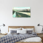 Uitzicht van een landweg tijdens de voorjaarstijd canvas afdruk (Insitu (Slaapkamer))
