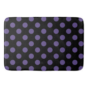 Ultra violette polka stippen op zwart badmat