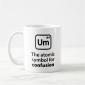 Um Le Symbole Atomique Pour La Mug De Café Confusi (Gauche)