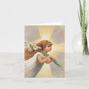 Un ange dans le ciel tenant des lys carte de Noël