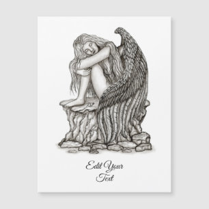 Un ange endormi sur la carte magnétique en pierre