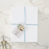 Un bébé brasse des étiquettes de préférence pour l (Avec de laficelle)