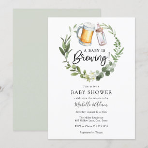 Un bébé brasse une invitation de Baby shower