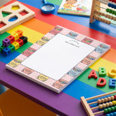Un bloc-notes à motif crayon de la part d'un ensei