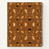 Un cahier à spirale avec une couverture marron (Dos)
