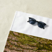 un cèdre de l'Himalaya sur les serviettes de plage (En situation)