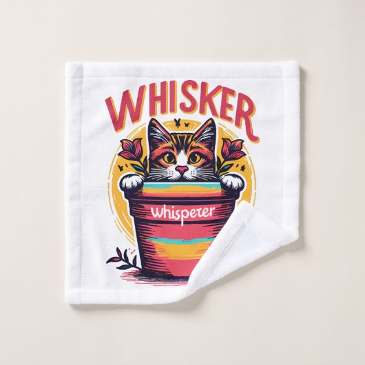 Un chat qui regarde de derrière un pot de fleurs (Gant de toilette)