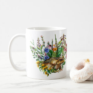 Un Crapaud Parmi La Mug Des Fleurs