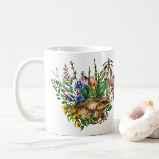 Un Crapaud Parmi La Mug Des Fleurs (Avec donut)