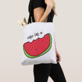 Un dans un sac fourre-tout blanc melon 2 (De près)