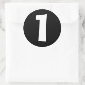 Un grand Stickers rond noir par Janz (Sac)