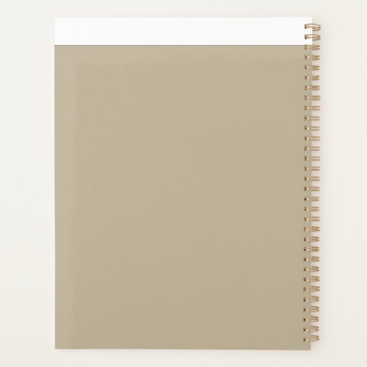 un homme en costume et cravate debout devant un mu (Dos)