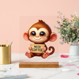 Un mignon bureau a besoin de singe café