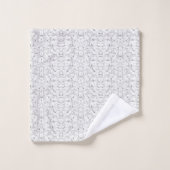 Un motif texturé aux teintes blanches et grises, (Gant de toilette)