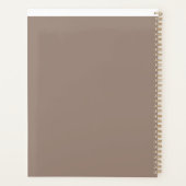 un mur marron avec une horloge (Dos)