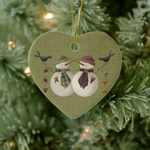 Un ornement de Noël en céramique Couple de Neige