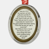 Un ornement rond de ~ de Tuit (Gauche)