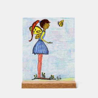 Un petit fée et papillon