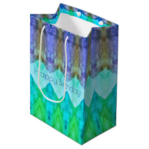 Un sac cadeau d'anniversaire moyen en violet et bl