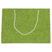 Un sac de shopping vert avec une poignée blanche (Devant)