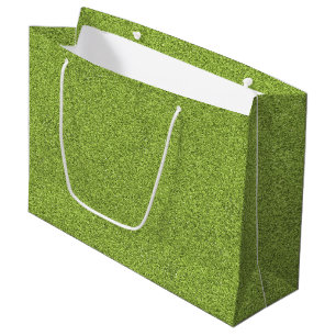 Un sac de shopping vert avec une poignée blanche