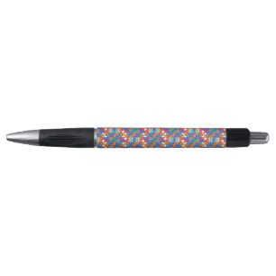 Un stylo coloré avec une pointe noire et un clic