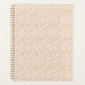 Un tapis marron avec un motif complexe se trouve s (Devant)