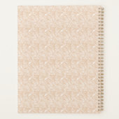 Un tapis marron avec un motif complexe se trouve s (Dos)