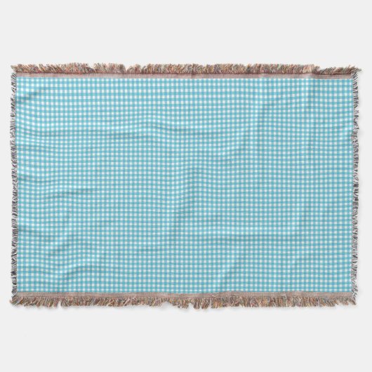 Une couverture à carreaux bleu clair et blanc (Devant)