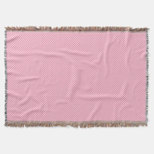 Une couverture tissée rose avec un motif subtil (Devant)