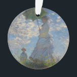 Une femme avec un parasol par Claude Monet<br><div class="desc">Femme avec un Parasol - Madame Monet et Son Fils de Claude Monet, huile sur toile 1875, est un tableau d'une femme en robe blanche tenant un parapluie sur la tête sur le sommet d'une colline couverte d'herbe et de fleurs sauvages, rétroéclairé contre un ciel bleu brillant et des nuages...</div>