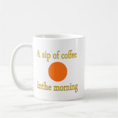 Une gorgée de café le matin dans une tasse (Gauche)
