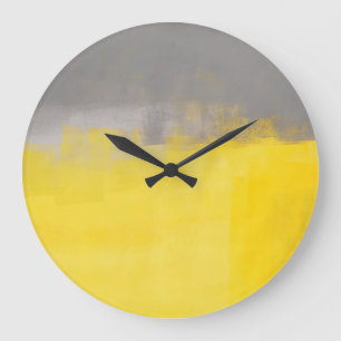 "" Une horloge grise et jaune abstraite simple