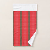 Une pomme rouge vif est posée sur une surface blan (Serviette à main)