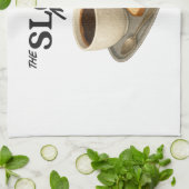 Une serviette de cuisine avec une image de café et (Plié)