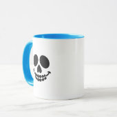Une tasse avec un sourire. (Devant gauche)