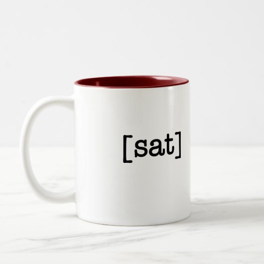 Une tasse une tasse de café de samedi de jour (Gauche)