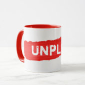 UNPLUG tekst op rode verf mok (Voorkant links)